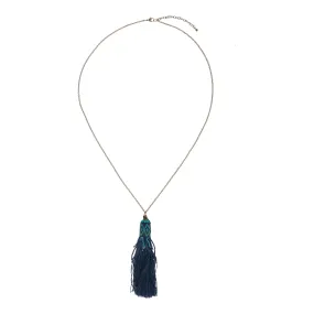 Blue tasselled necklace on cord